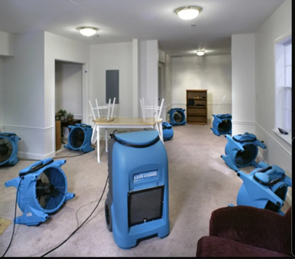 Air movers and dehumidifier setup for Water Damage Restoration in Dickinson